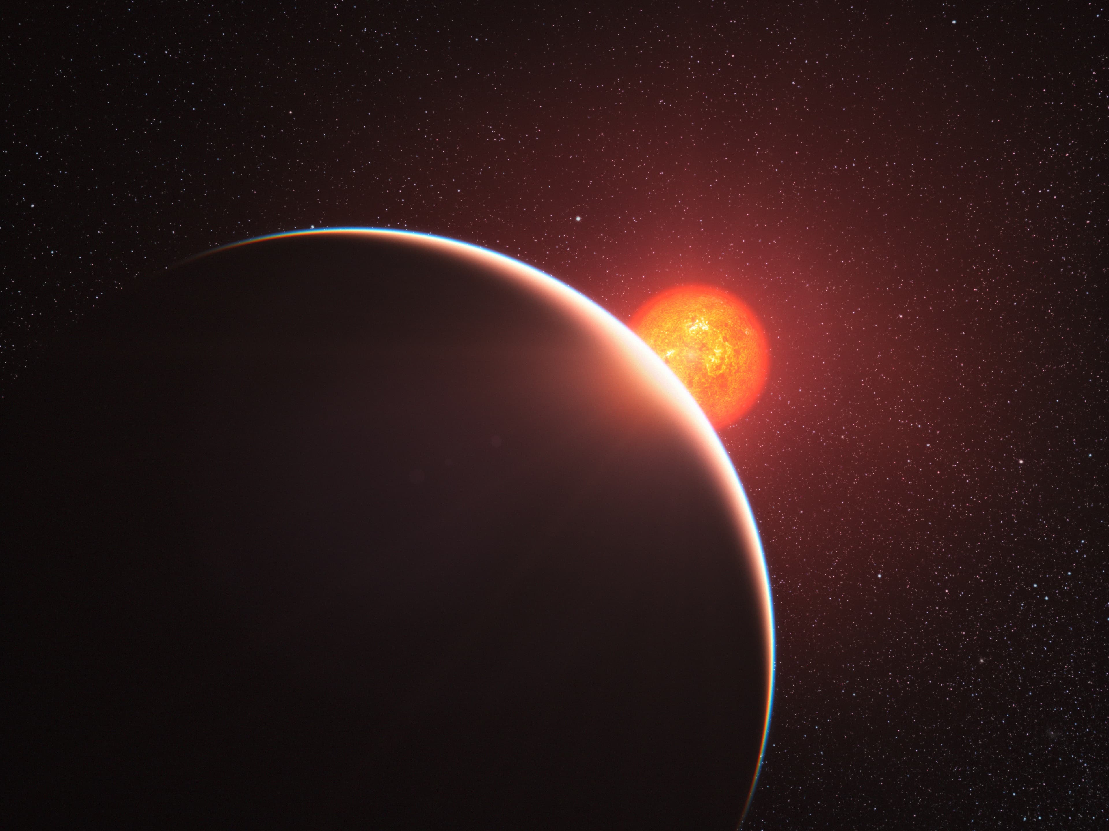 Ground-Based Spectrograph Finds Tentative CO₂ Signal in the Atmosphere of Sub-Neptune GJ 1214 b